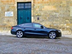 black car near the building