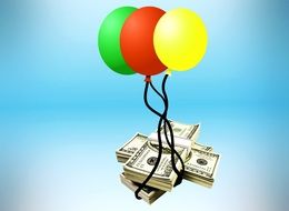 dollars are tied to balloons