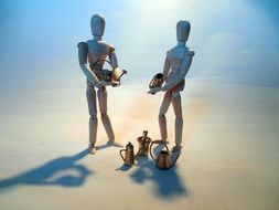 robot figures with watering cans