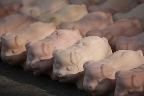 a lot of piggy banks in the shape of a pig