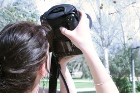 woman takes pictures of nature