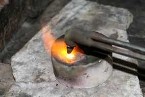 burning metal with a soldering iron