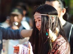 Young Lady in ethnic wear sells Accessories