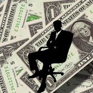 silhouette of a businessman on the dollar background