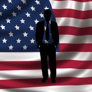 silhouette of a man on the background of the american flag