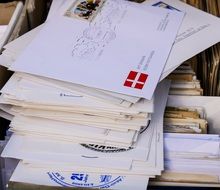 a stack of stamped letters