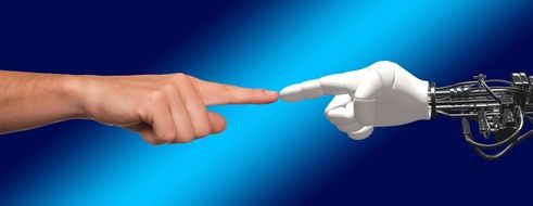 hand of robot and man