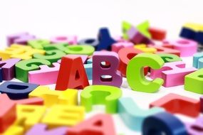 colored letters on a white surface