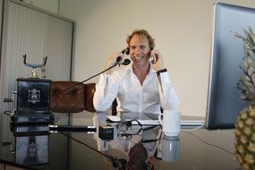 talk on a new and retro phone at the same time