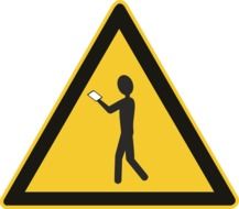 warning shield about people with smartphones