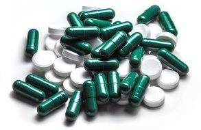 green capsules and white tablets, drugs