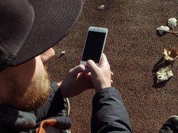 stylish man with Iphone 6