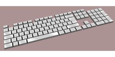 white keyboard on a pink background