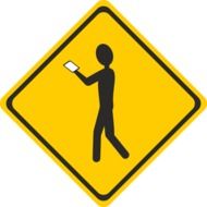 yellow shield with man with smartphone