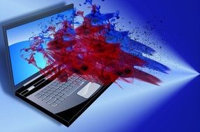 red spray on the screen of the laptop