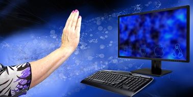 female hand in front of the monitor