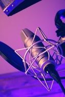 studio microphone in a purple background