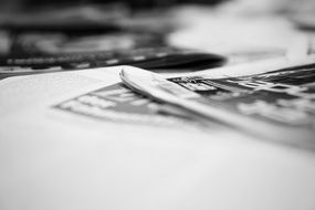 Newspaper, soft focus, black and white