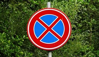 "No stopping" traffic sign on the road