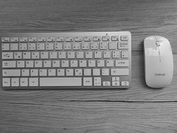 silver keyboard on the table