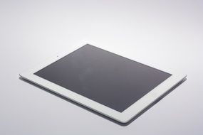 white tablet on the white surface