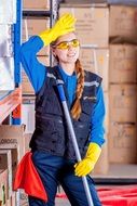 worker in yellow goggles