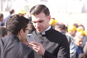 The priest and the mobile phone