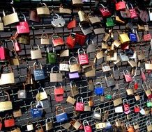 padlocks of couples on the metal fence