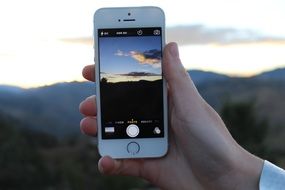 taking picture of sunset on iphone