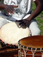 African man drumming outdoor