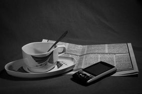 Coffee ,phone and newspaper