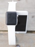 smart white Iphone and Iwatch