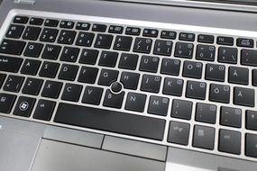 Keyboard of grey laptop