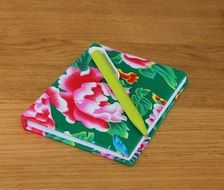 Notebook with flower drawings on it