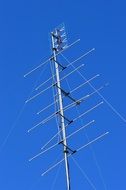 Tv Antenna against the blue sky