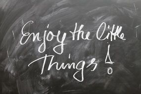 inscription in white chalk on a school blackboard