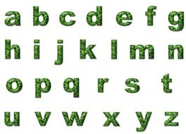 green letters of the English alphabet on a white background