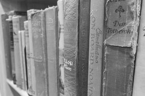 antique books in black and white close-up