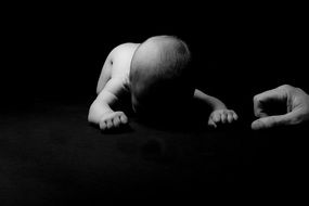 black and white picture of a newborn