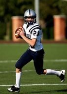 American football player with ball