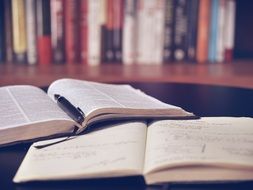 Open Books on desk in Library