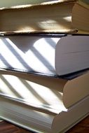 stack of books with white leaves