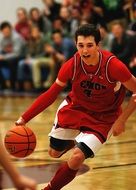 High School Basketball player on a competition