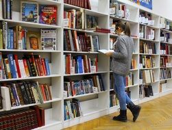 girl with books in the library