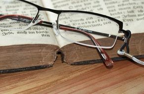 reading glasses on a book