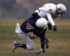 tackling American football players