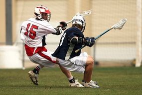 lacrosse players on the field