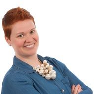 photo of a redhead girl with a short haircut