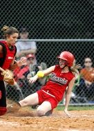 girls are playing softball
