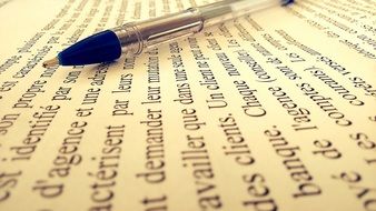 pen on a sheet of text